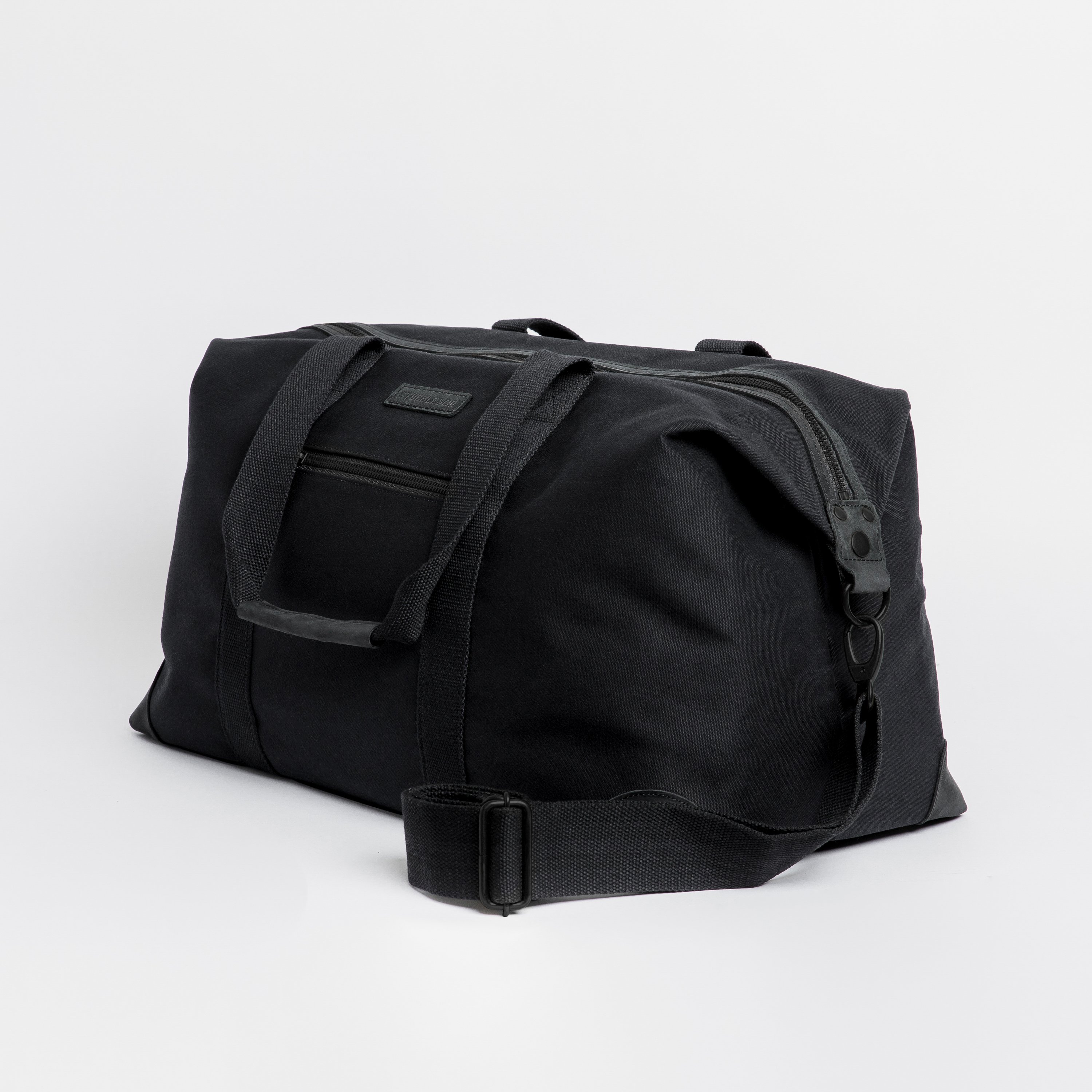 The Weekender. Waterproofed Canvas and Leather Holdall. 15" Laptop Pocket., All Black